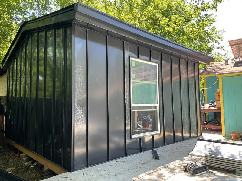 Black standing seam metal wall panels for Roof Inspection in Adams